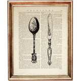 Decorative vintage spoon with a patterned bowl beside a slender antique-style utensil on an aged dictionary page